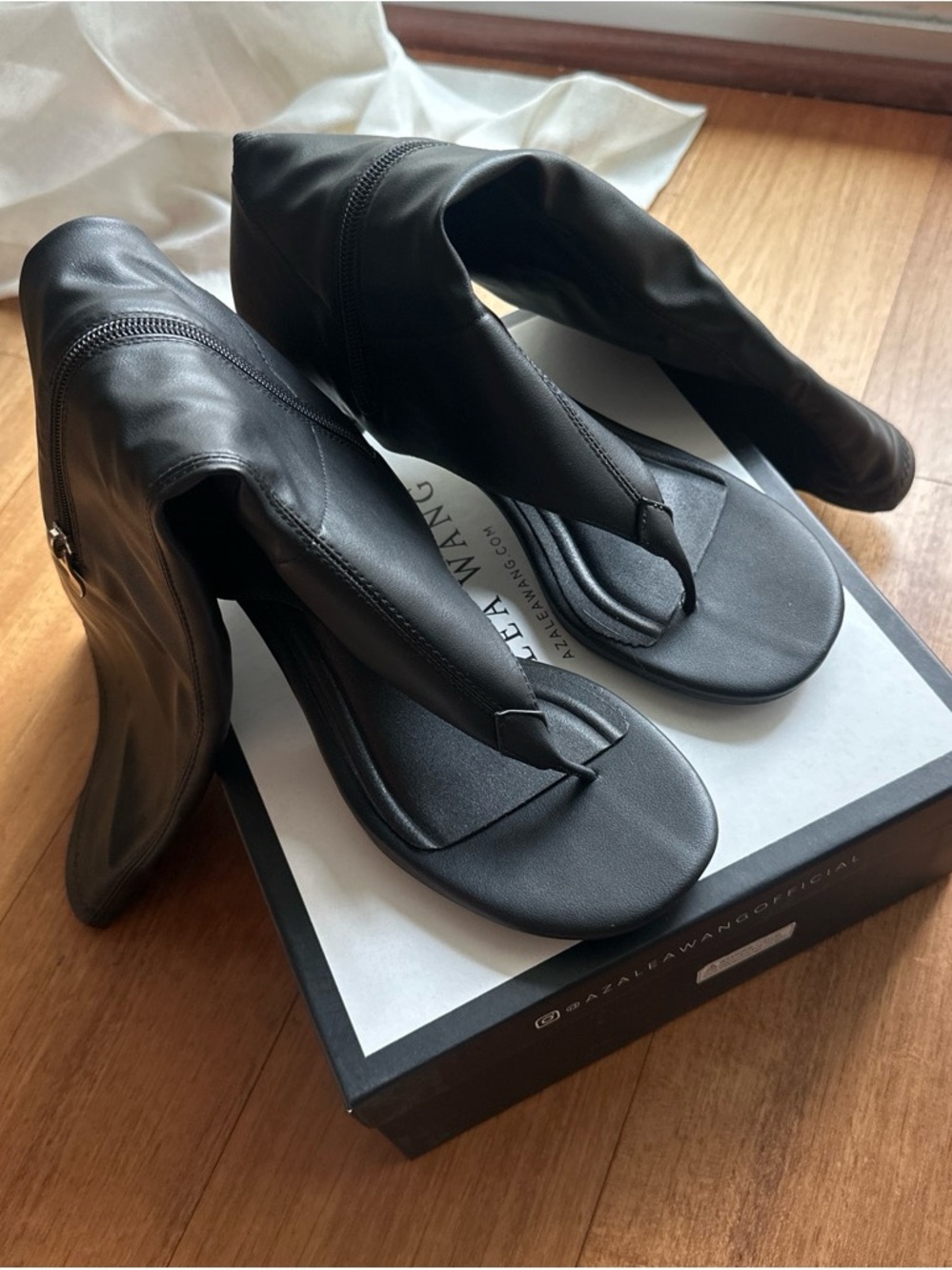 Black Leather Thong Mules with Sock Boot Silhouette